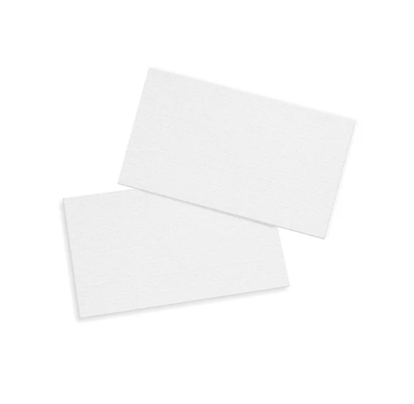 Blank business card over white background with soft shadows. — Stok fotoğraf