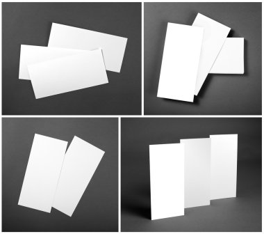 Set of Blank white flyers over gray background. Identity design.
