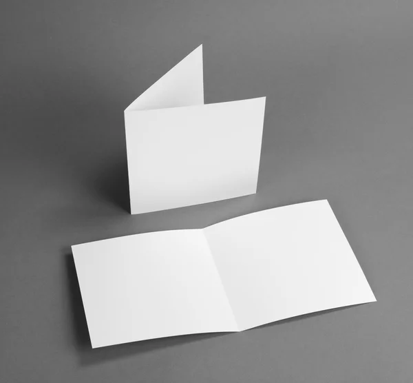 White empty closed card on grey to replace your design. — Stock Photo, Image