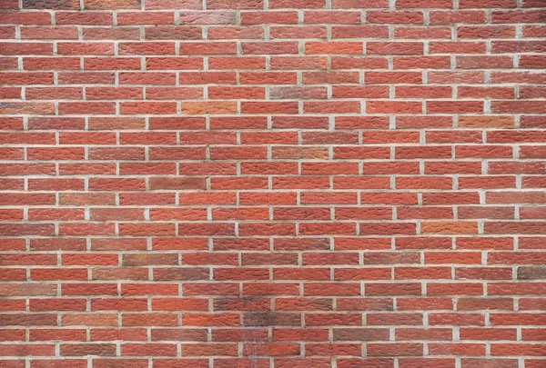 Wall with regular red brick stones — Stock Photo, Image