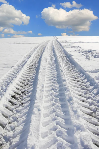 Wheel tracks from a truck tire in winter — Stock Photo, Image