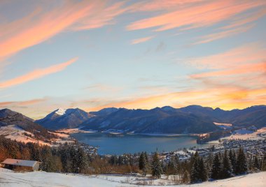 lake schliersee and mountain range, sunset sky background