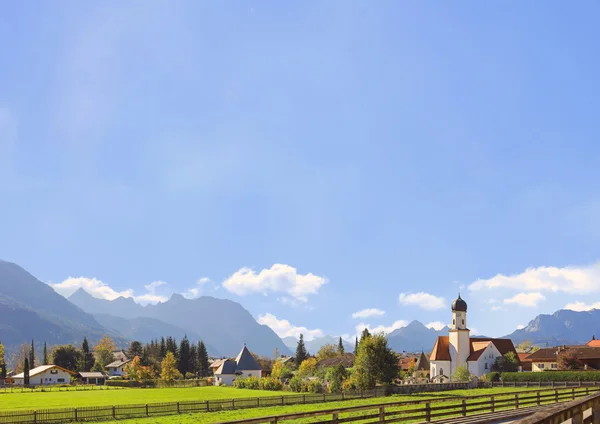 Alpine landscape wallgau with blue sky background — ストック写真