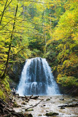 beautiful waterfall from hachelbach creek, Josefsthal Schliersee in autumnal forest, upper bavarian landscape and hiking destination