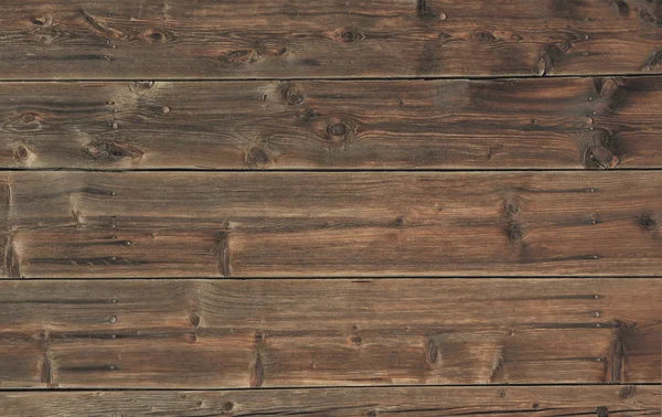 Vecchia facciata con assi di legno — Foto Stock