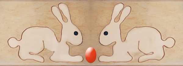 Два пасхальных кролика сидят неблагоприятные, форма со струной формируется — стоковое фото