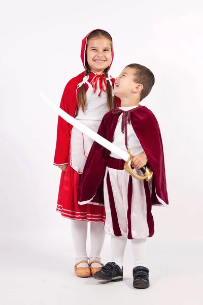 Menina e menino em trajes de contos de fadas — Fotografia de Stock