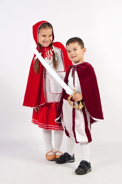 Twee kinderen in kostuums, Prince, Little Red Riding Hood — Stockfoto