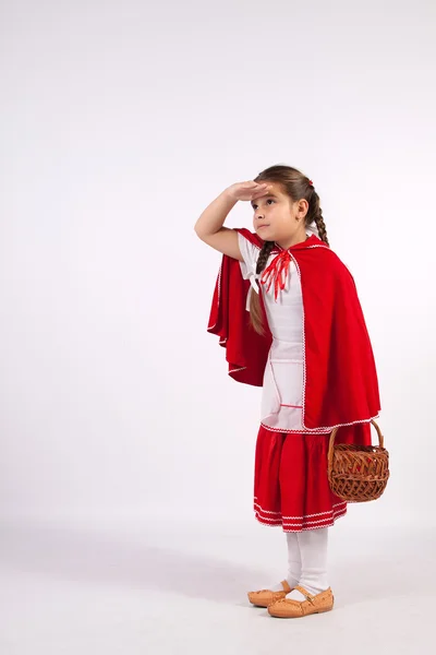 Little girl in costume looking into the distance — Stock Photo, Image