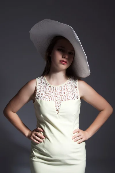 Young lady in white hat — Stock Photo, Image