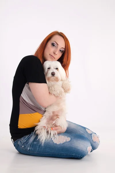 Young woman with her dog — Stock Photo, Image