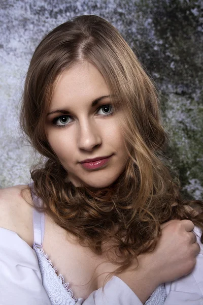 Young long-haired curly blonde woman — Stock Photo, Image