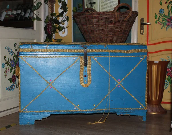 Blue vintage wooden treasure chest isolated.