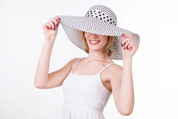 Portrait of young pretty woman in elegant hat smiling. Isolated Stock Image