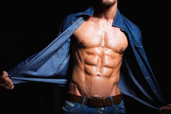 Muscular and sexy body of young man in jeans shirt — Stock Photo, Image