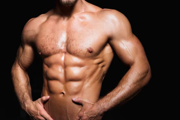 Torso muscular e sexy de jovem desportista com abdominais perfeitos — Fotografia de Stock