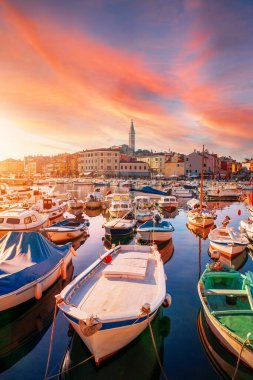Cozy and quiet town of Rovinj with beautiful colorful houses on the Istrian peninsula, Adriatic sea at sunset  in Croatia clipart