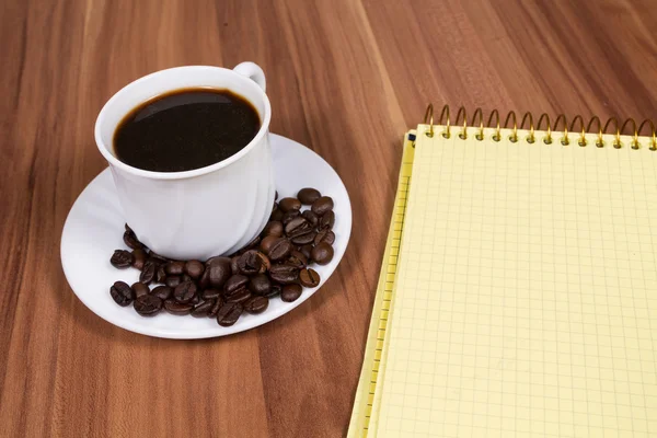 Φλιτζάνι καφέ, σημειωματάριο — Φωτογραφία Αρχείου