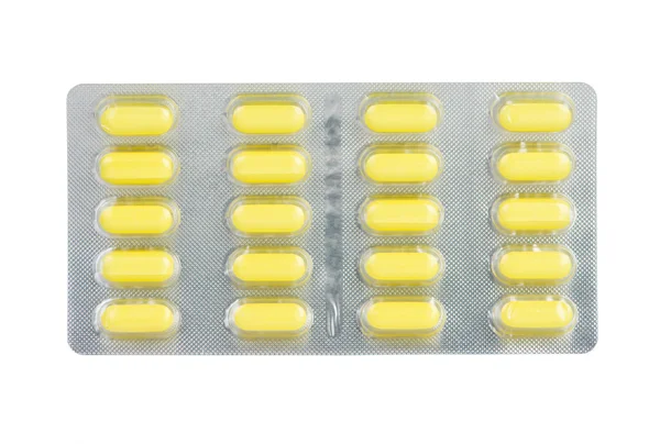 Comprimido amarillo en blíster — Foto de Stock