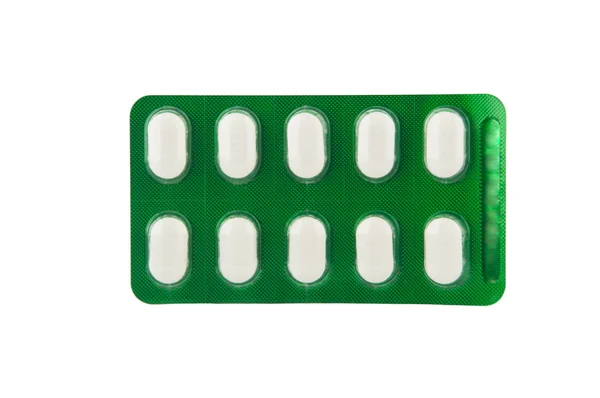 Białych tabletek w blistrze zielony — Zdjęcie stockowe