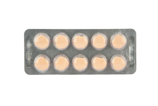 Orange tablet in blister pack — Stock Photo, Image