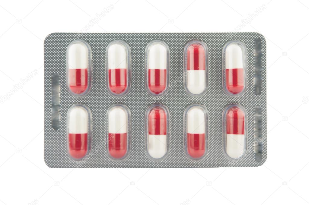 Red and white capsule in pack show medicine concept