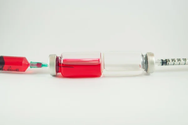 Injection syringe and vials — Stock Photo, Image