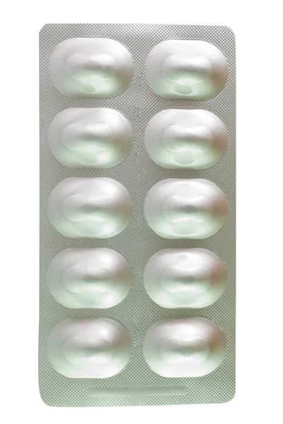 Plaquette thermoformée en aluminium sur blanc — Photo
