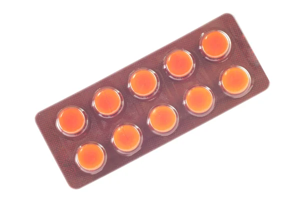 Medicine tablet in brown blister pack — Stock Photo, Image