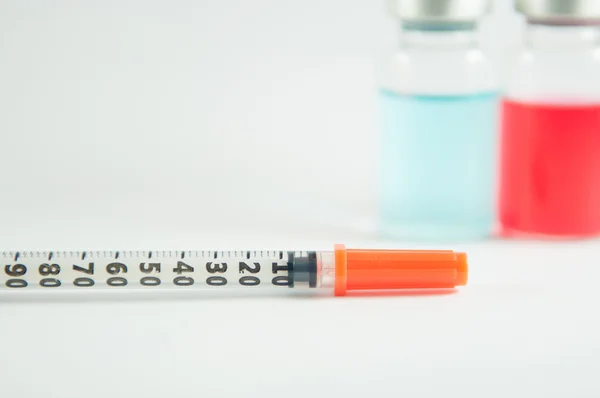Injection syringe and vials — Stock Photo, Image
