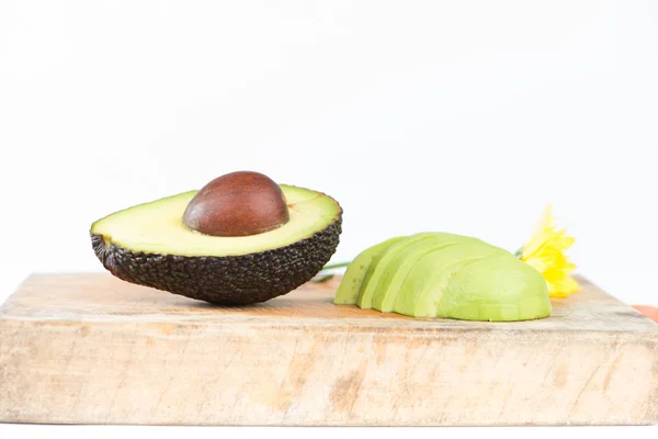 Avocado fruit on wood — Stock Photo, Image