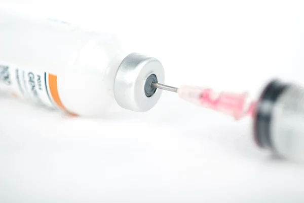 Injection preparation with vial and syringe on white — Stock Photo, Image
