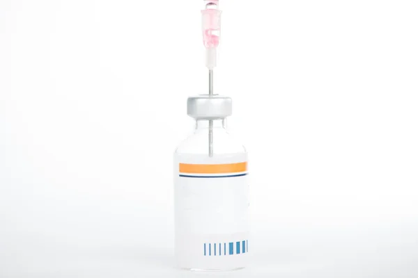 Injection preparation with vial and syringe on white — Stock Photo, Image