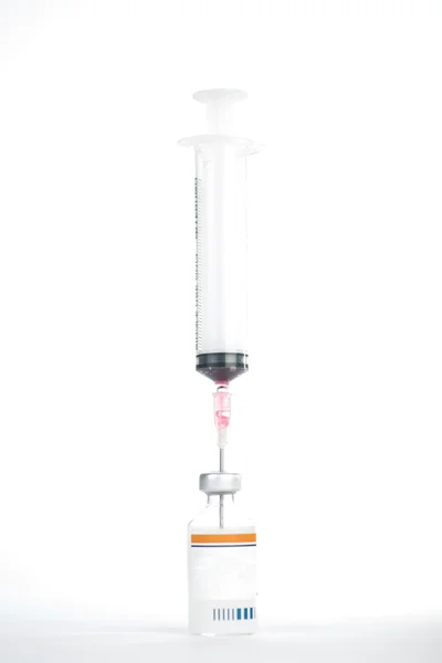 Injection preparation with vial and syringe on white — Stock Photo, Image