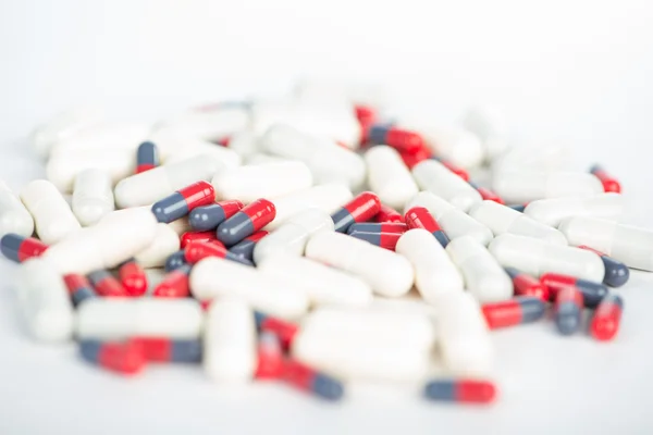 Closed up medicine capsule on white — Stock Photo, Image