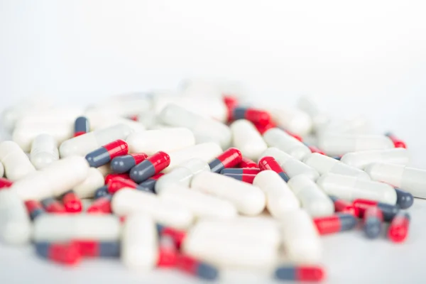 Closed up medicine capsule on white — Stock Photo, Image