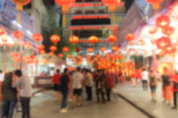 Blur of chiness paper lamp and people travel on the road — Stock Photo, Image