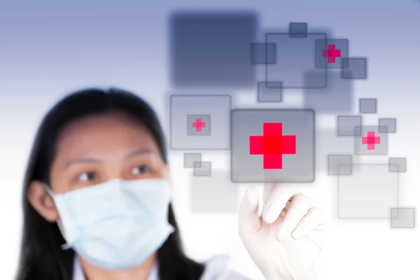Infirmière appuyant sur le type médical moderne de boutons Images De Stock Libres De Droits