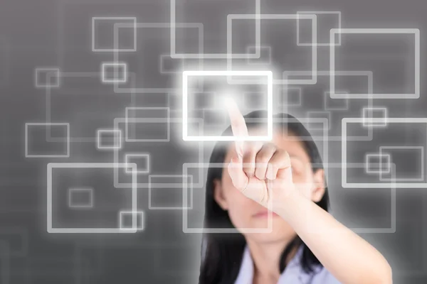 Girl pushing high technology button with computor screen — Stockfoto