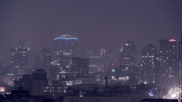 Snowstorm in Downtown Montreal Towers Lights during Dark Night of Winter — Stock Video