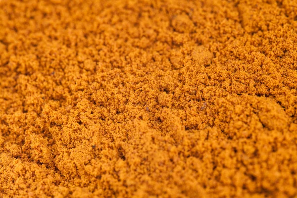 Polvere di curcuma Macro texture — Foto Stock