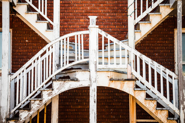 Editorial - July 24, 2014 in Trois-Riviere, Quebec, Canada. Symmetrical Staircases in the Poor Old Trois-Riviere Area where the poverty is always present, but where the houses are hystorical.
