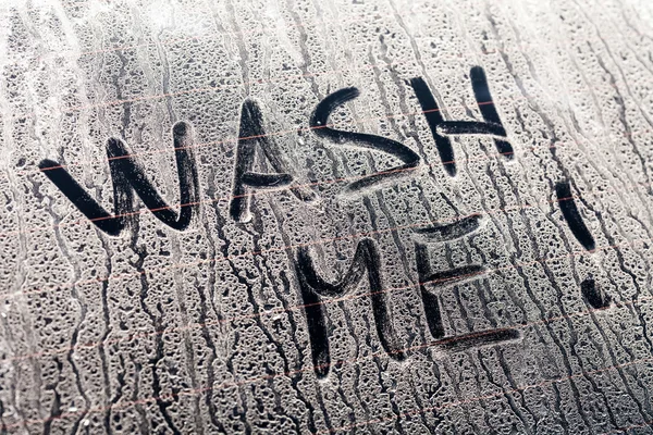 Wash Me Words on a Dirty Car Window — Stock Photo, Image