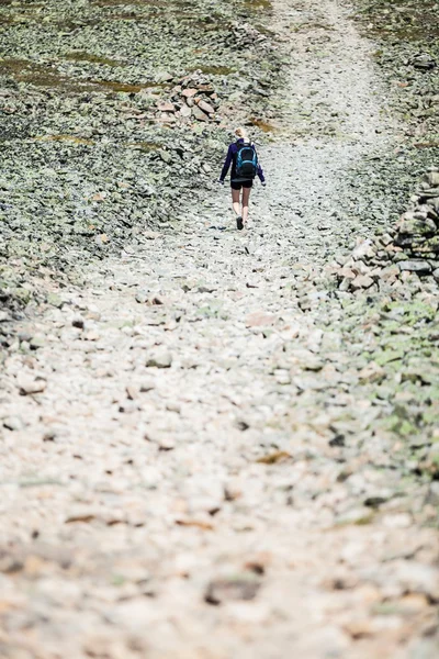 Woman Walking on a Rocky Hiking Path — Stock Photo, Image