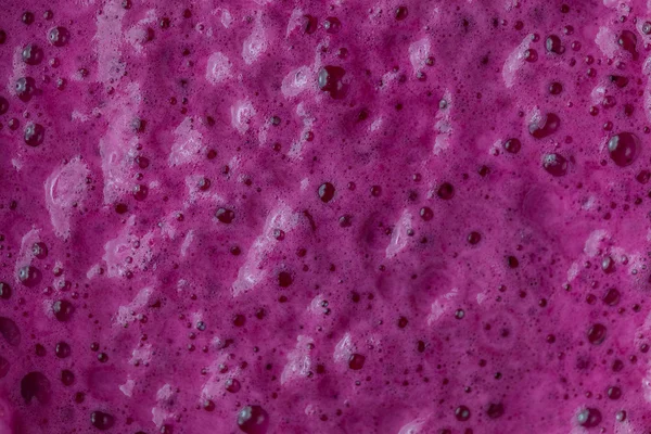 Закрытие текстуры сока фиолетовой свеклы — стоковое фото