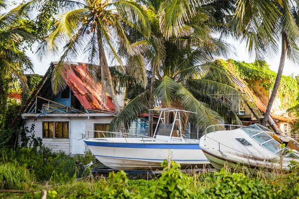 Destroyed House with boats