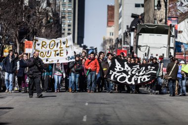 View of the First line of Protesters walking in the Street clipart