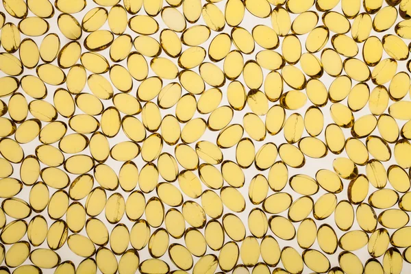 Makro detail textury transparentní vitaminů — Stock fotografie