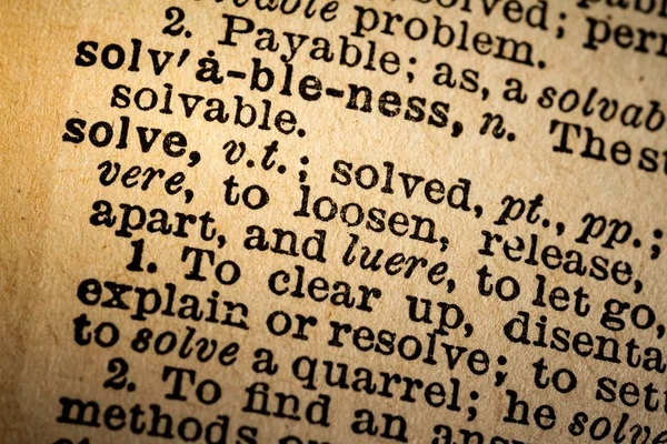 Close-up of the word SOLVE and its definition — Zdjęcie stockowe