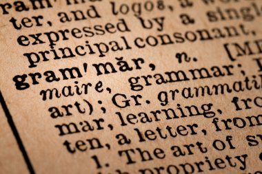 Close-up of an Opened Dictionary showing the Word GRAMMAR